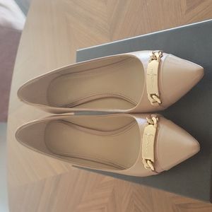 Tan Coach pumps